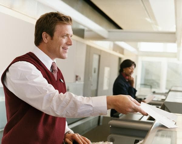 Ticket agent at an airline counter
